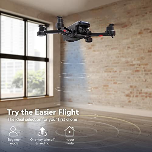 Drone hovering indoors, ideal for beginners with easy flight modes.