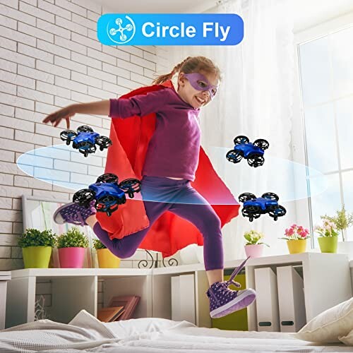 Child dressed as superhero playing with small drones indoors.