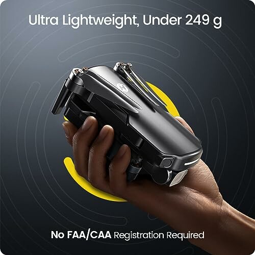 Hand holding a compact drone labeled ultra lightweight under 249g, no registration required.