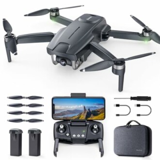 Drone with accessories including remote, batteries, and cables.