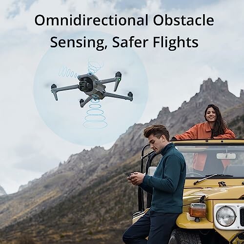 Drone with obstacle sensing technology over a couple by a yellow jeep in a mountainous area.