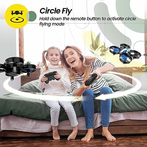 Mother and daughter playing with drones in circle fly mode on bed.